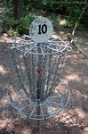 A frisbee golf basket.