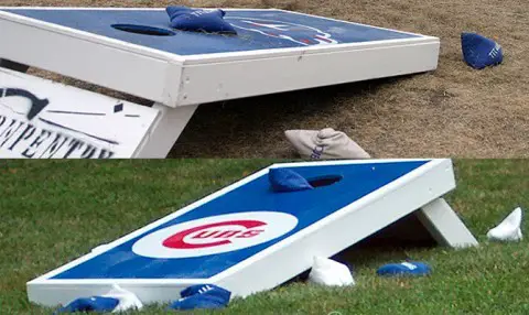 two different cornhole boards made of wood